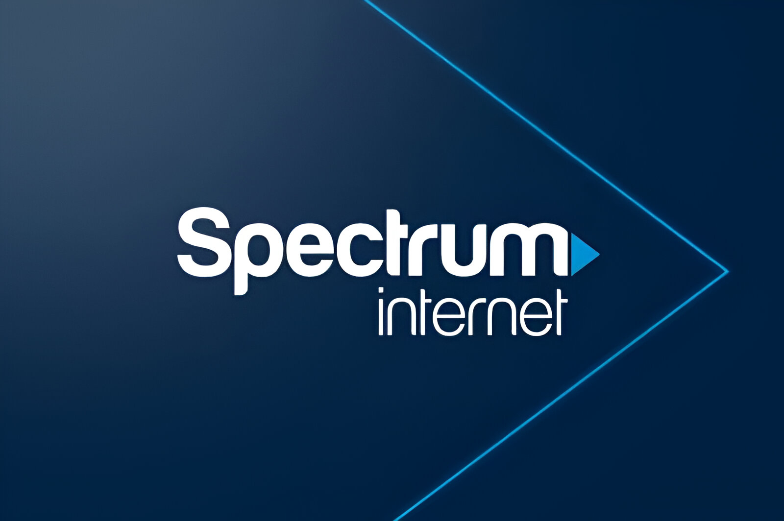 Spectrum Internet logo on a navy blue background, featuring white text and a blue triangular design